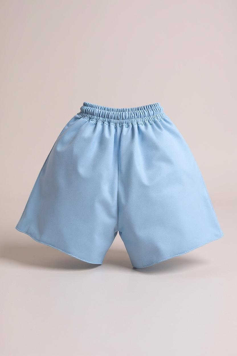 COMME DES FUCKDOWN - SHORTS CON ETICHETTA AZZURRI