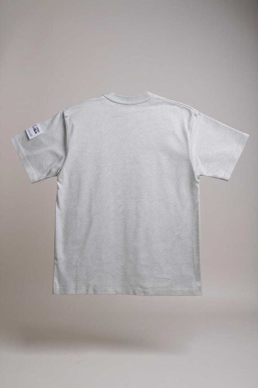 COMME DES FUCKDOWN - TSHIRT IN JERSEY AZZURRA CON STAMPA