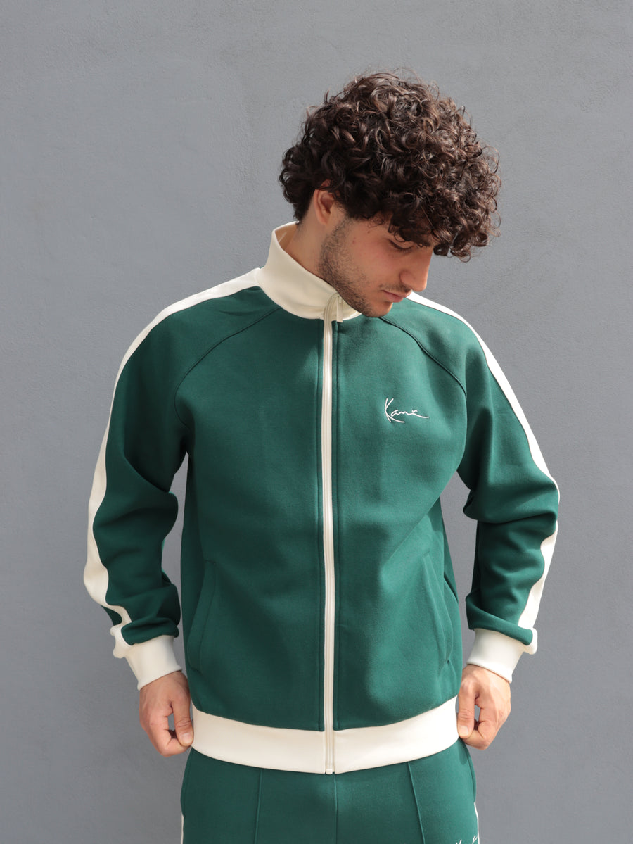Tuta Karl Kani verde con bande laterali – Stile streetwear premium — 4/8
