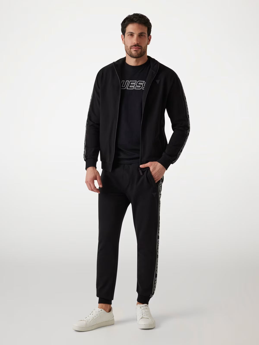 Pantaloni Guess - Pantaloni Jogger Logo Laterale — 1/4
